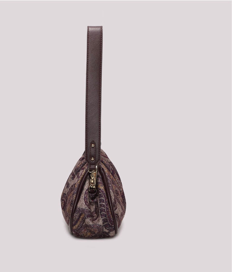Borsa clutch in fantasia con chiusura a sfere Mimi-Mua