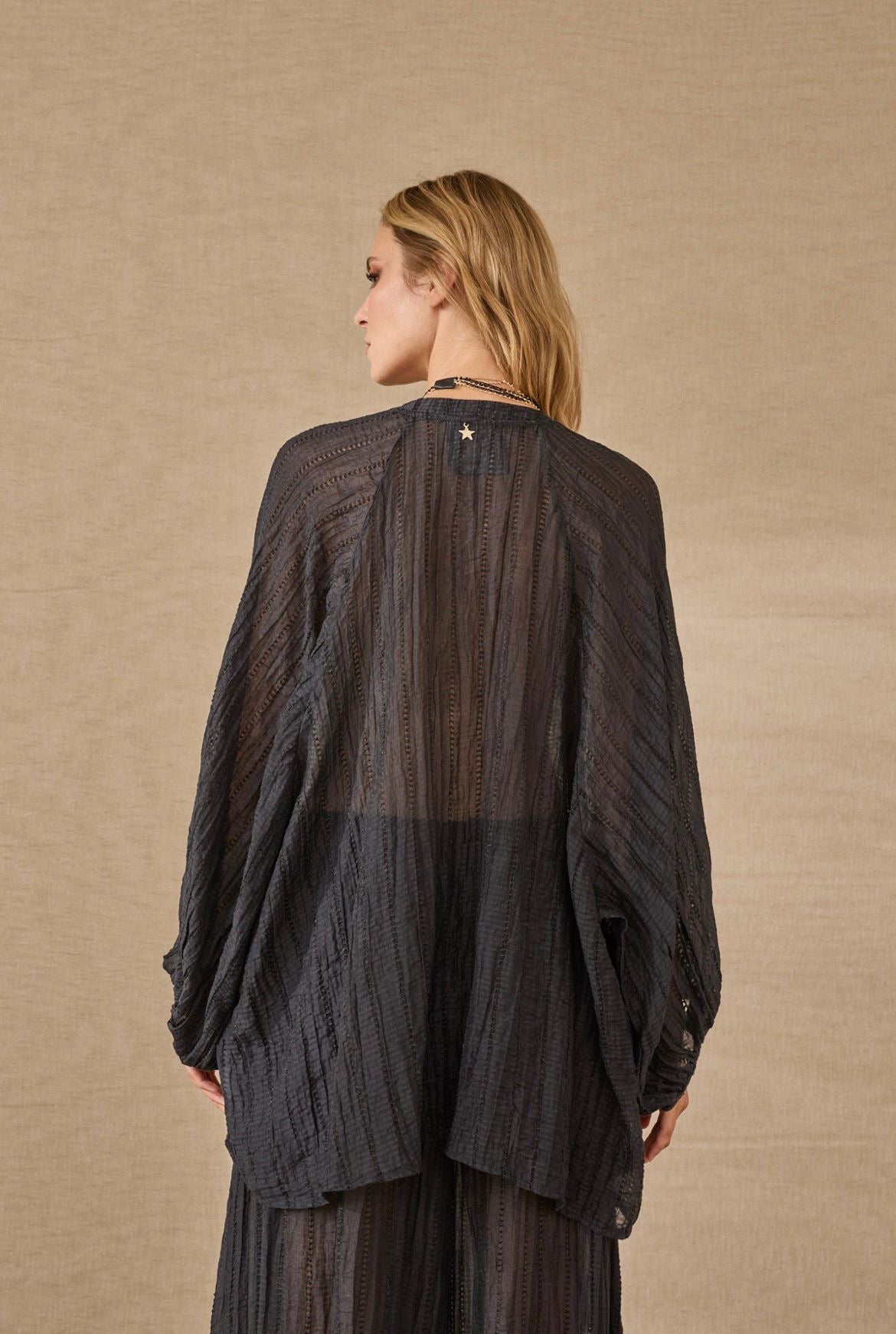 Blusa semi trasparente Souvenir